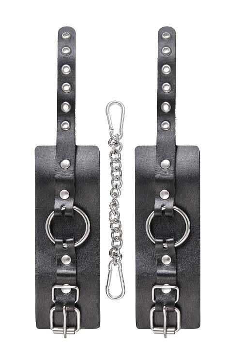 Черные наручники из толстой натуральной кожи с люверсами