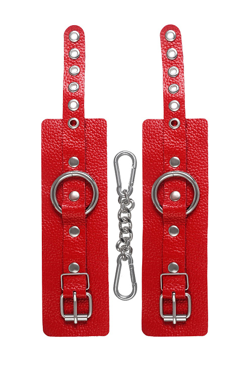 Красные мягкие кожаные наручники с люверсами