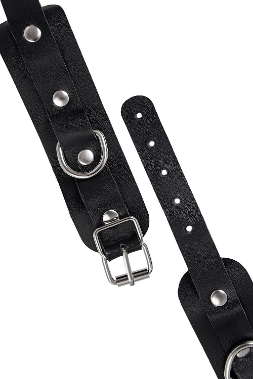 Черные кожаные наручники-браслеты со скруглёнными углами